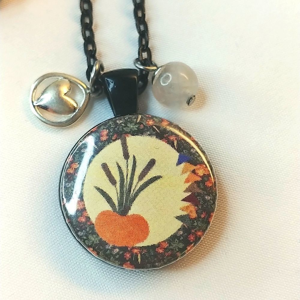 Vintage magnetic charm necklace. 26 inch. Comes with 4 charms. - Picture 2 of 6